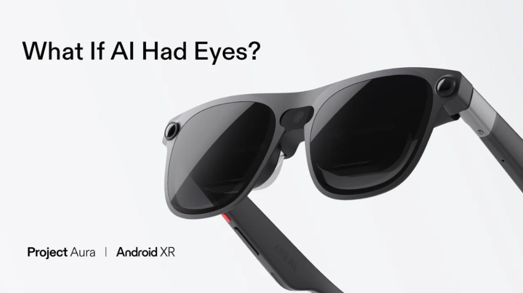 Sleek black Project Aura AR smart glasses by Xreal, featuring built-in cameras and powered by Android XR